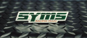 SYMS フロントグリル用エンブレム OEM Y090099001